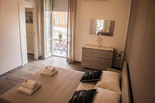 Postel nebo postele na pokoji v ubytování Un posto al sole