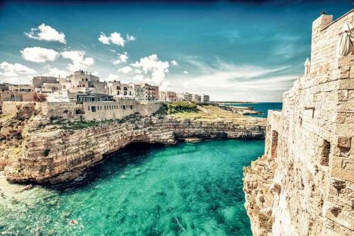 an aerial view of a bridge over the water at Gli Amanti del Sogno in Conversano