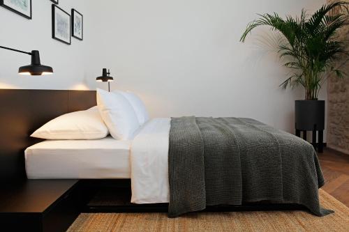 Ένα ή περισσότερα κρεβάτια σε δωμάτιο στο Boutique rooms Kastel Ismaeli