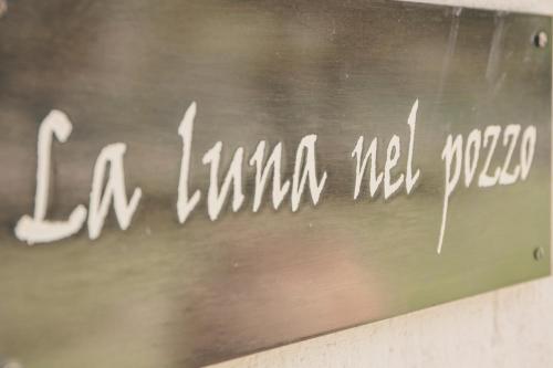 a chalkboard with the words lilianilianhyde written on it at La Luna nel Pozzo in Parma