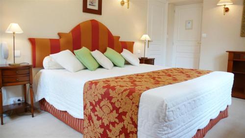 Cama o camas de una habitación en Manoir De Kertalg