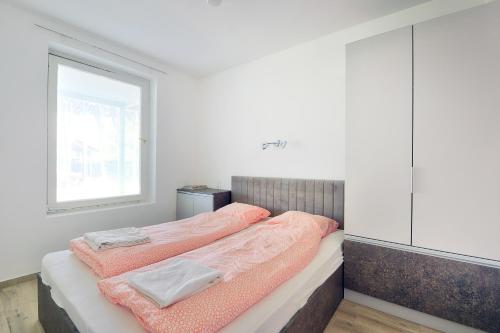 Posteľ alebo postele v izbe v ubytovaní Villa Oliver 3 Siófok