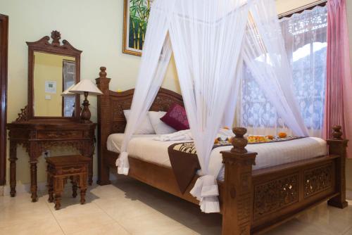 Postel nebo postele na pokoji v ubytování Suparsa's Homestay