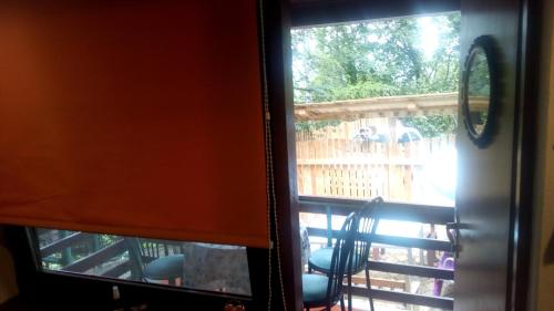 a view out of a window of a balcony at Holiday Home Nature Neno in Visoko