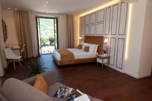 Una cama o camas en una habitación de Il Belvedere