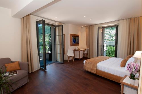 Una cama o camas en una habitación de Il Belvedere