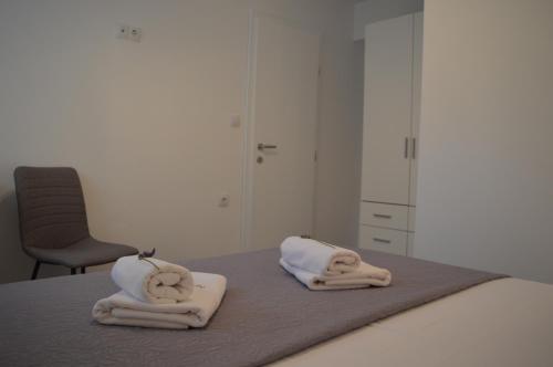 Ένα ή περισσότερα κρεβάτια σε δωμάτιο στο Apartman Talija