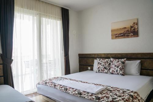 Postel nebo postele na pokoji v ubytování Marini Casa