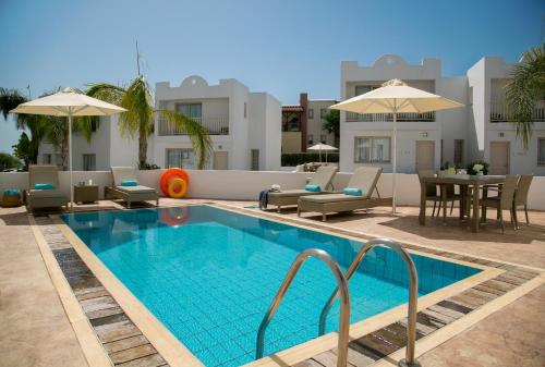 The swimming pool at or close to Althea Kalamies Luxury Villas