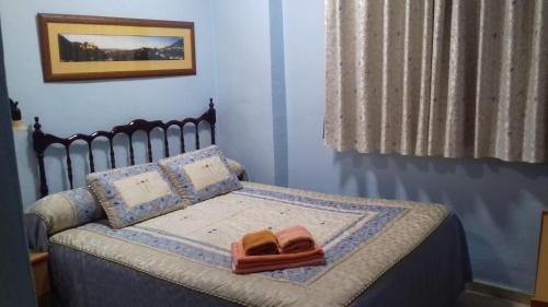 Llit o llits en una habitació de la castanuela albayzin