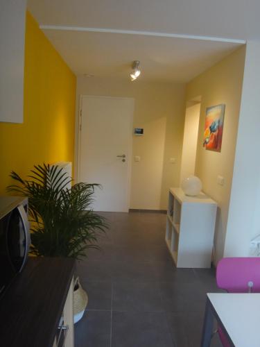 Posezení v ubytování Appartement rez Terrasse et Jardin