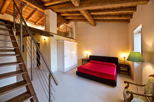 Ένα ή περισσότερα κρεβάτια σε δωμάτιο στο Agriturismo Pratello