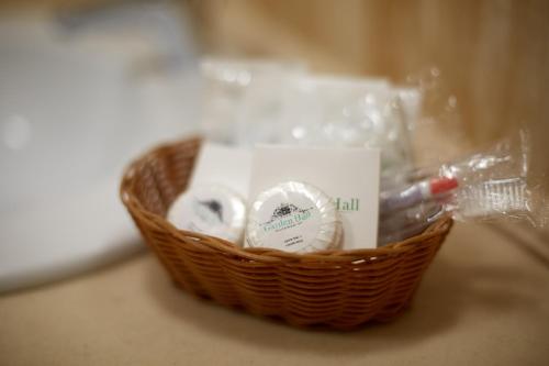 a basket of toiletries is sitting on a counter at Garden Hall in Ternopilʼ