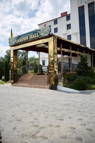 a building with a sign that reads garden hall at Garden Hall in Ternopilʼ