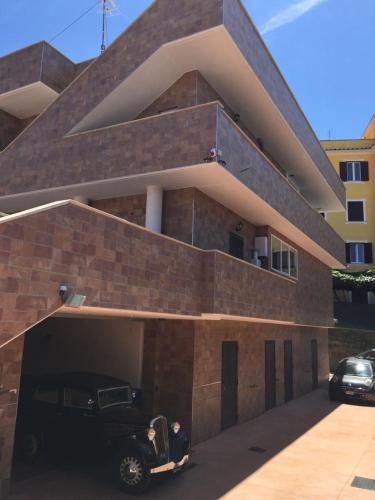 a car is parked inside of a brick building at Beb la lupa in Rome