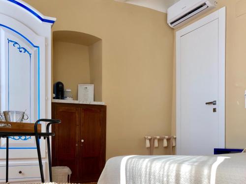 Cama o camas de una habitación en Orto al Mare Room Rental