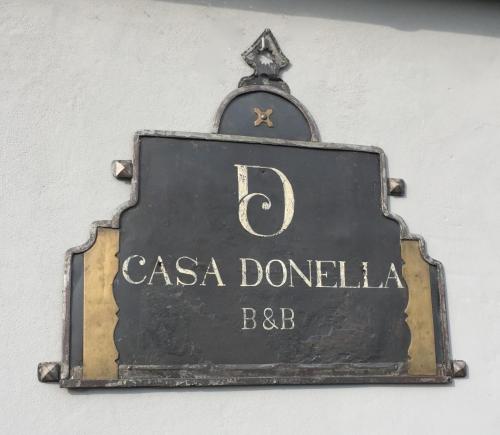 a sign that reads casa doña dominica bar at Casa Donella B&B in Gricignano