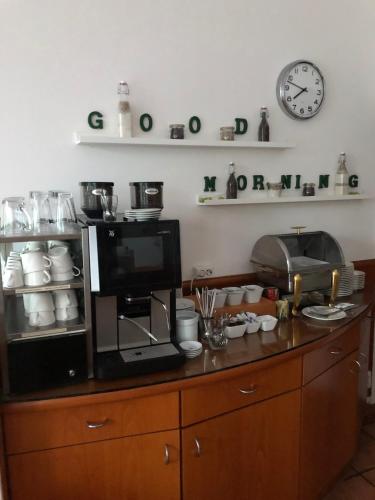 Køkken eller tekøkken på The Ascot Hotel