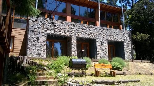 Κήπος έξω από το Maria del Bosque Apart Hotel / Cabañas