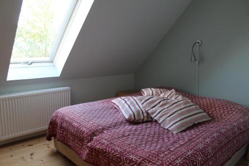 Postel nebo postele na pokoji v ubytování Quistgaarden Bed & Breakfast