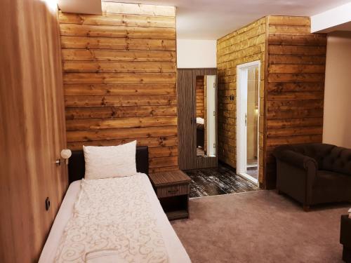 Un pat sau paturi într-o cameră la Villa Grazia