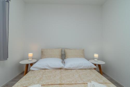 Ein Bett oder Betten in einem Zimmer der Unterkunft Apartment Matea
