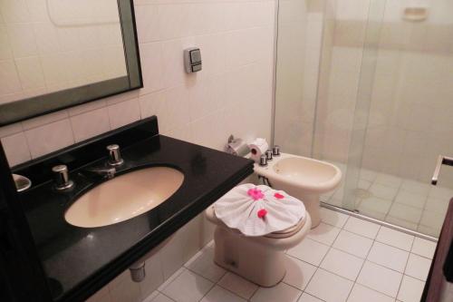 Um banheiro em Hotel Columbus