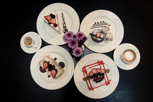 a group of plates of food on a table at LaiLa Hotel CDMX Reforma in Mexico City