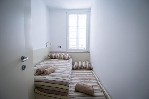 Postel nebo postele na pokoji v ubytování Gloria Holiday - Apartment Rebecca