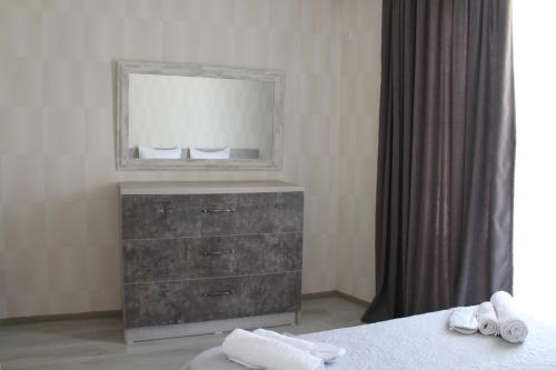 Кровать или кровати в номере Hotel Kavkasioni