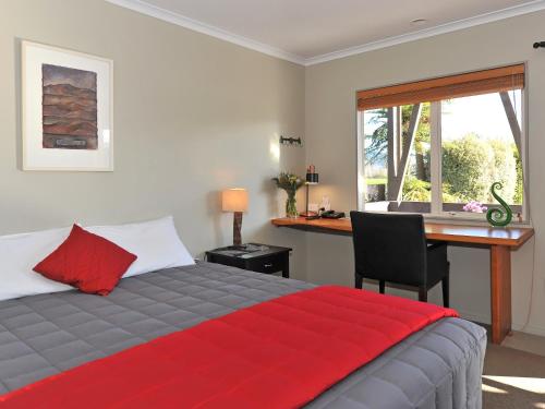Ein Bett oder Betten in einem Zimmer der Unterkunft Mohua Motels