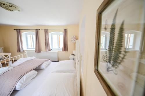 Postel nebo postele na pokoji v ubytování Casa Paulini