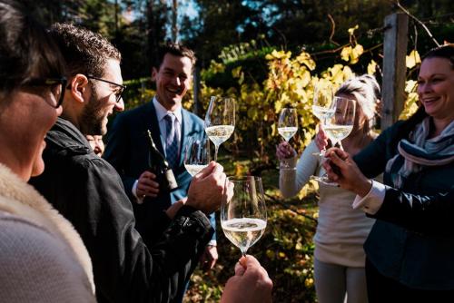 a group of people holding glasses of wine at Mount Lofty House in Adelaide