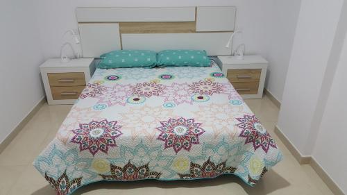 Postel nebo postele na pokoji v ubytování Apartamento Juli4