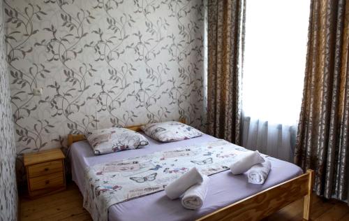 Postel nebo postele na pokoji v ubytování Family Mini-Hotel Martirosyan's and tours