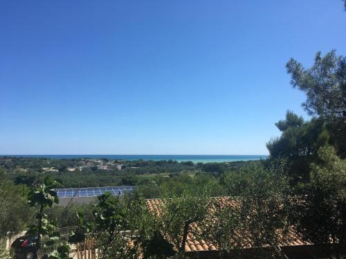 a view of the ocean from the roof of a house at Viestemare Resort & SPA in Vieste