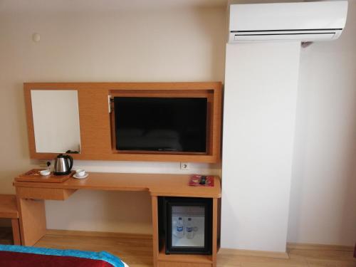 TV a/nebo společenská místnost v ubytování Bursa şahin hotel