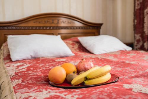 Una cama o camas en una habitación de Hotel Sofia