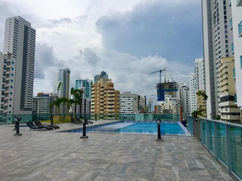 a swimming pool in the middle of a city at Luxury Infinitum in Cartagena de Indias