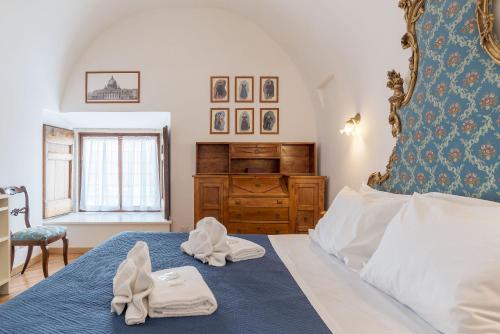 Кровать или кровати в номере Campitelli Fascinating Apartment