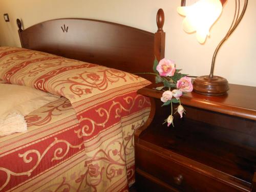 Ein Bett oder Betten in einem Zimmer der Unterkunft Cà 'd Gnese