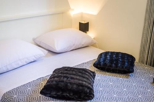 Katil atau katil-katil dalam bilik di Apartman Nino