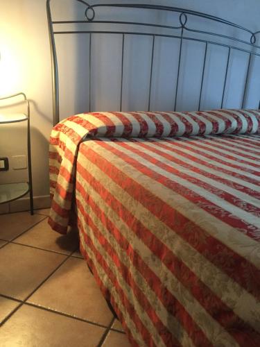 Ein Bett oder Betten in einem Zimmer der Unterkunft Cà 'd Gnese