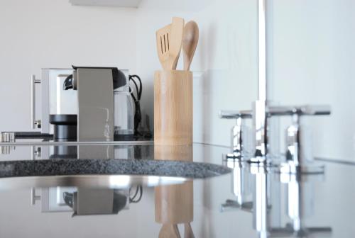 Η κουζίνα ή μικρή κουζίνα στο Dünenblick Apartments