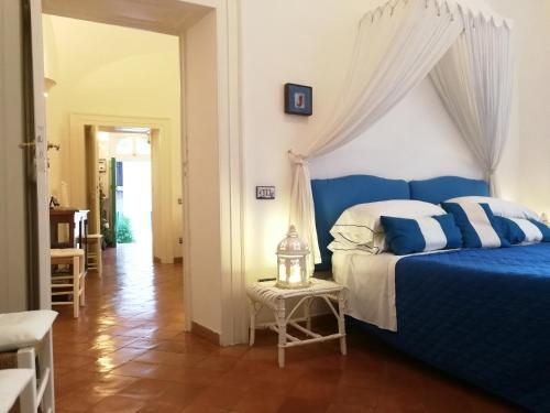 Ένα ή περισσότερα κρεβάτια σε δωμάτιο στο Vicolo 23 House