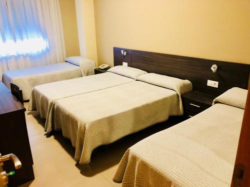 Hotel Susuquiにあるベッド