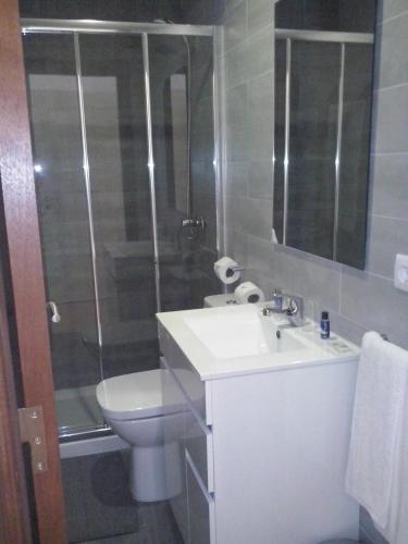 Ванная комната в Nas Palhas Deitado