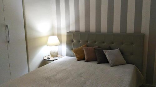 Ένα ή περισσότερα κρεβάτια σε δωμάτιο στο Hotel Sirio