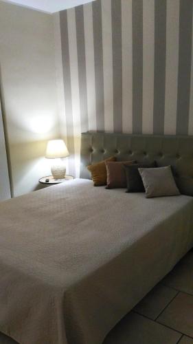 Ένα ή περισσότερα κρεβάτια σε δωμάτιο στο Hotel Sirio