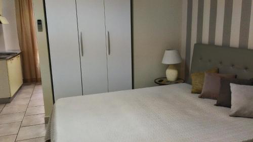 Ένα ή περισσότερα κρεβάτια σε δωμάτιο στο Hotel Sirio